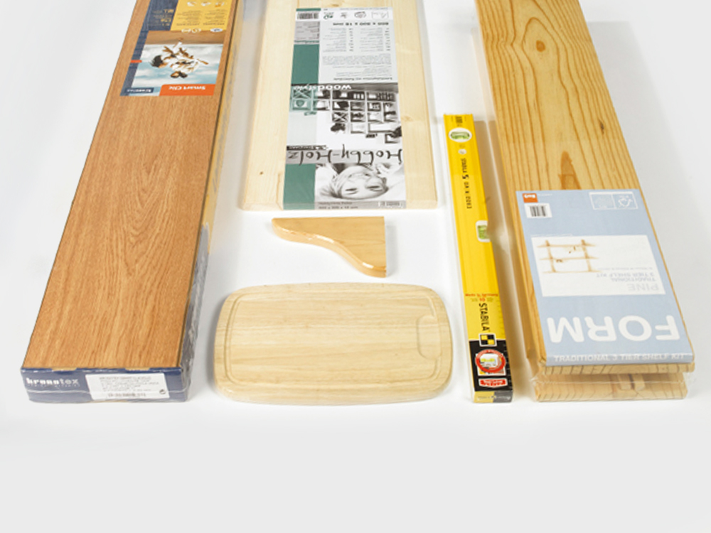 Abbildung von Holz, Laminat und Parkett in der Folienverpackung