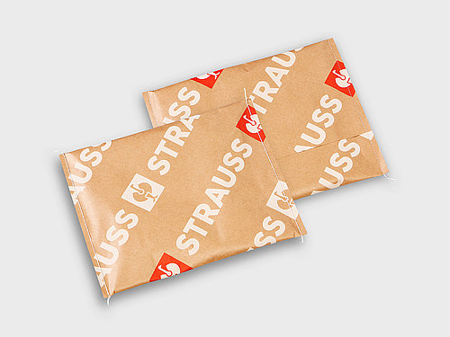 Versandverpackung aus bedrucktem Papier mit vernähten Seiten