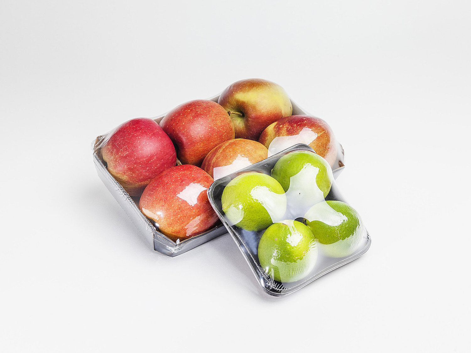 Abbildung von Äpfeln in Folienverpackung